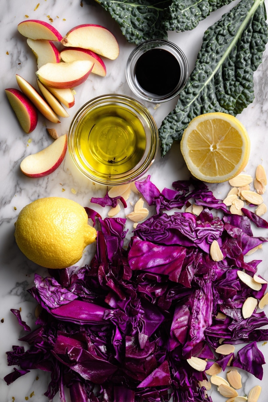 Flat lay of vibrant chopped red cabbage leaves, fresh kale leaves with ribs removed, thinly sliced red apple wedges, and delicate sliced almonds scattered around, a small glass bowl of glossy golden olive oil, a halved bright yellow lemon, and a drizzle of dark balsamic vinegar artistically pooled nearby, all placed on a white marble surface, photo taken with an iphone --ar 2:3 --v 7 - Chopped Red Cabbage Kale Salad with Lemon Balsamic Dressing, healthy colorful kale salad, quick vegan green cabbage salad, nutrient-rich cabbage and kale salad, tangy lemon balsamic dressing recipe