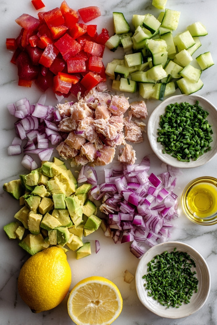 Flat lay of chopped cucumber, finely diced red onions, bright red bell pepper pieces, creamy chopped avocado, flaked light tuna chunks, fresh chopped chives, and a halved lemon with visible juice droplets, all beautifully arranged with a small drizzle of golden olive oil glistening nearby, placed on a white marble surface, photo taken with an iphone --ar 2:3 --v 7 - Avocado Tuna Salad, healthy tuna salad, quick lunch recipes, easy seafood salad, fresh avocado salad
