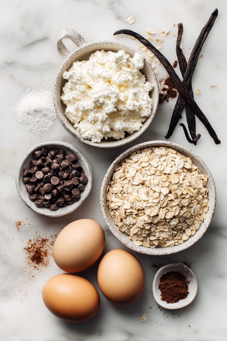 Flat lay of creamy cottage cheese, a neat pile of rolled oats, fresh egg whites in a small glass pitcher, a small bowl of shiny dark chocolate chips, a tiny dish of warm cinnamon powder, and a vanilla bean pod split open, beautifully arranged with some scattered oats and chocolate chips for texture, placed on a white marble surface, photo taken with an iphone --ar 2:3 --v 7 - Chocolate Chip Protein Pancakes, healthy pancake recipes, high-protein breakfast, quick breakfast ideas, easy protein pancakes