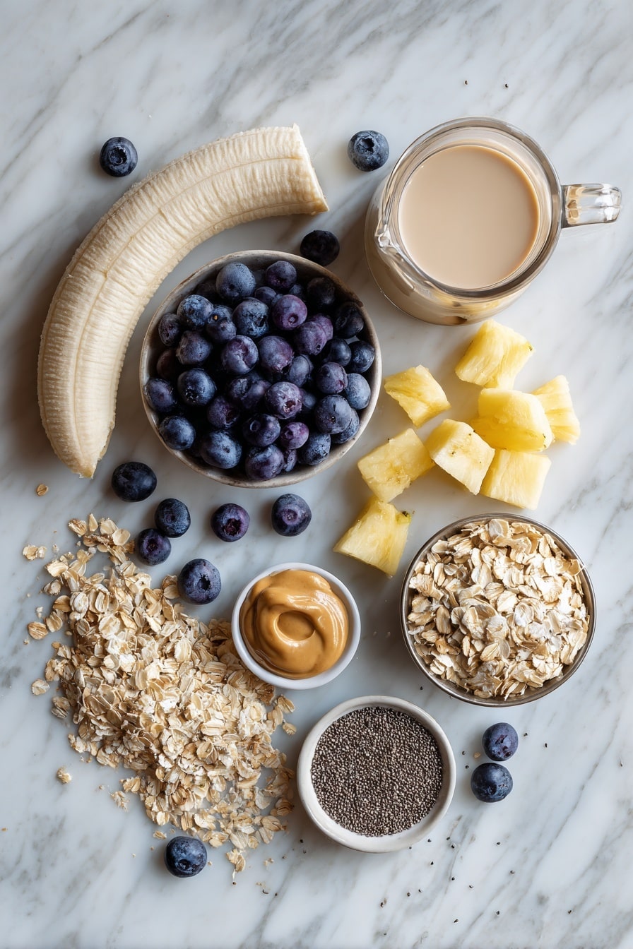 Flat lay of frozen banana halves, plump fresh blueberries, bright chopped pineapple pieces, creamy almond milk in a small glass jug, a smooth dollop of peanut butter, scattered chia seeds, and a small pile of oatmeal flakes arranged beautifully on a white marble surface, photo taken with an iphone --ar 2:3 --v 7 - Blueberry Banana Smoothie, healthy smoothie recipes, quick breakfast smoothies, nutritious fruit smoothies, easy fruity smoothie