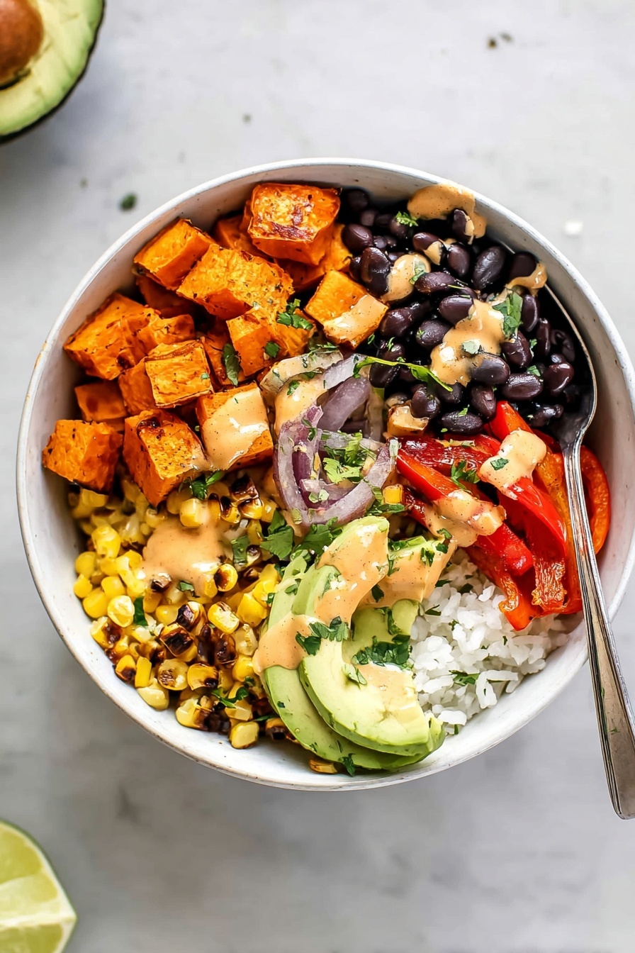 Vegan Sweet Potato Burrito Bowl Recipe 7 A white bowl on a white marbled texture is filled with five separate layers: at the top left, there are bright orange cubes of roasted sweet potatoes; next to them at the top right, shiny black beans; below the beans, sliced red bell peppers mixed with pieces of cooked red onion showing a glistening texture; at the bottom left, golden grilled corn kernels; and in the center bottom, thin slices of light green avocado over a bed of white rice mixed with green herbs. A light orange creamy sauce is drizzled over all ingredients, with some green chopped herbs sprinkled on top. A silver spoon is placed inside the bowl, leaning on the right side. photo taken with an iphone --ar 2:3 --v 7 - Vegan Sweet Potato Burrito Bowl, healthy vegan burrito bowl, plant-based sweet potato bowl, vegan dinner ideas, easy vegan lunch