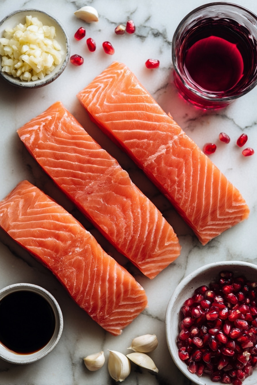 Flat lay of four fresh pink salmon filets, a small glass of deep red pomegranate juice, a small pile of minced garlic cloves, a small bowl filled with dark soy sauce, and a few whole garlic cloves artistically scattered, with a few pomegranate seeds sprinkled around for color contrast, placed on a white marble surface, photo taken with an iphone --ar 2:3 --v 7 - Pomegranate Glazed Salmon, healthy salmon recipes, easy seafood dinner, gourmet salmon dishes, holiday salmon main course