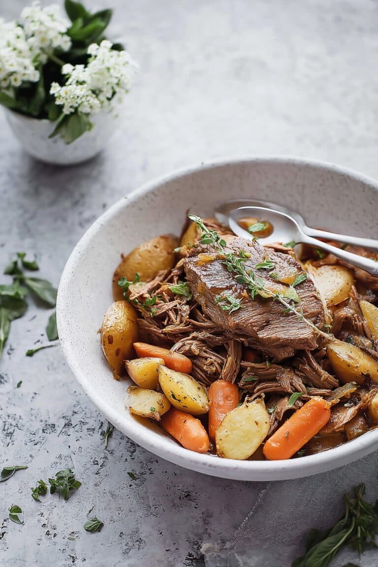 Slow Cooker Beef Roast with Carrots, Potatoes, and Herbs Recipe
