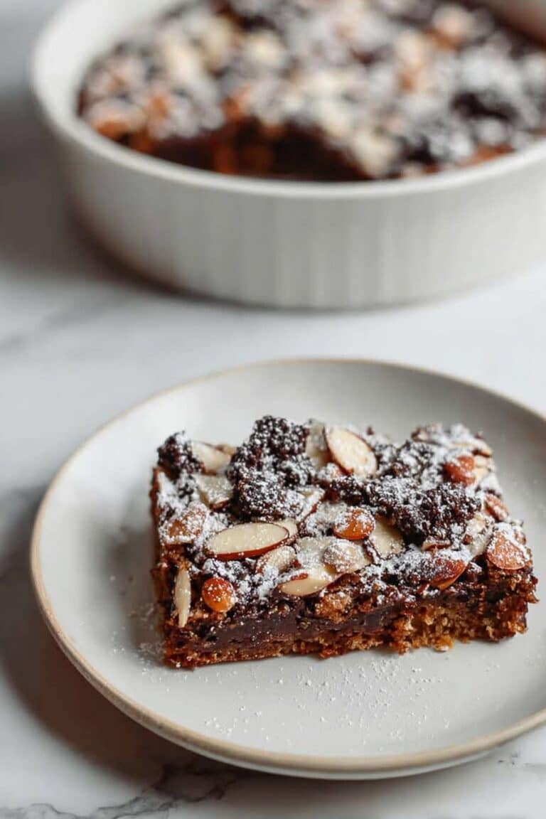 Chocolate Stuffed Pain au Chocolat French Toast with Sliced Almonds Recipe